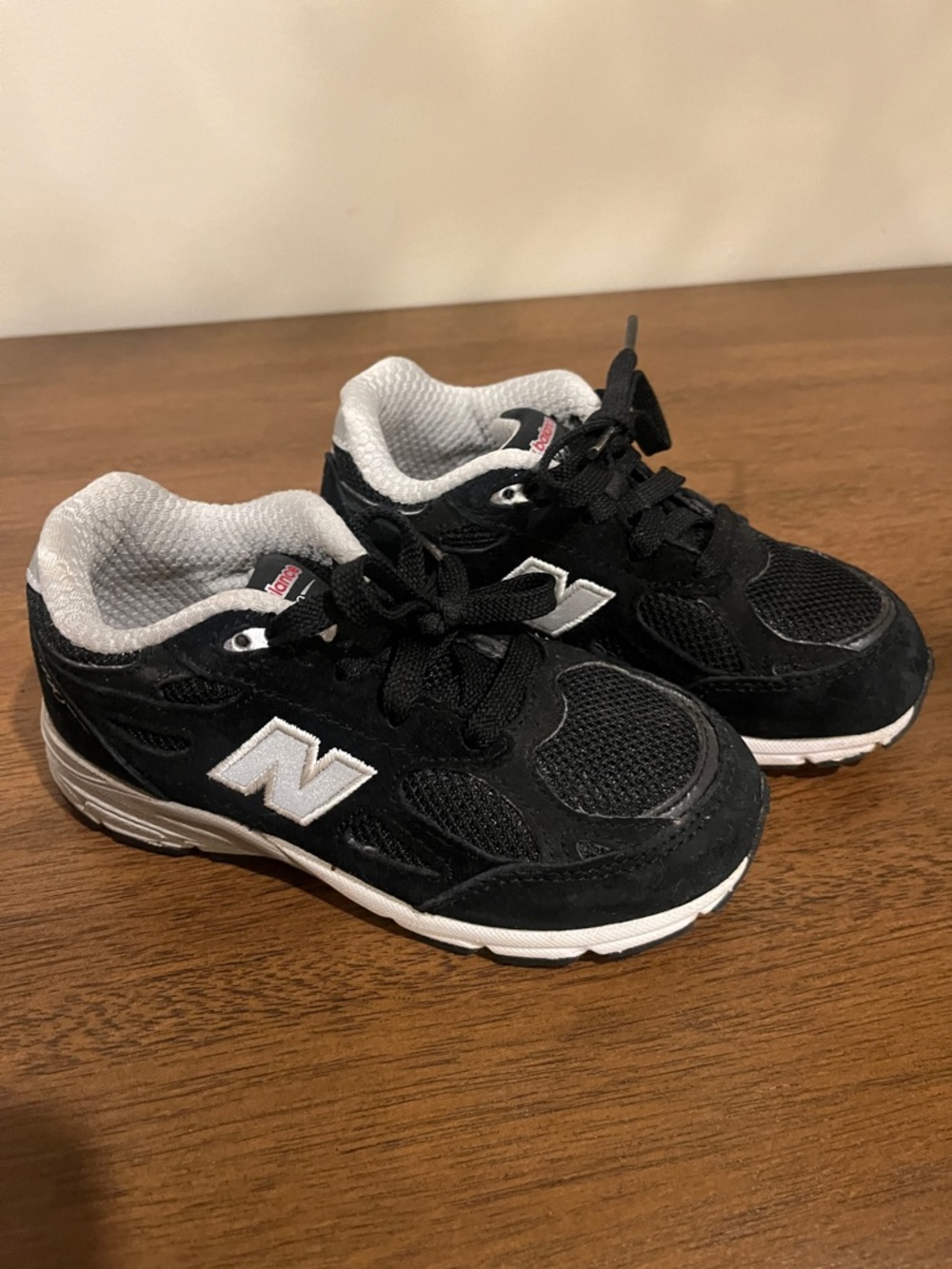 New Balance Kids Black and White Lace-Up Sneakers